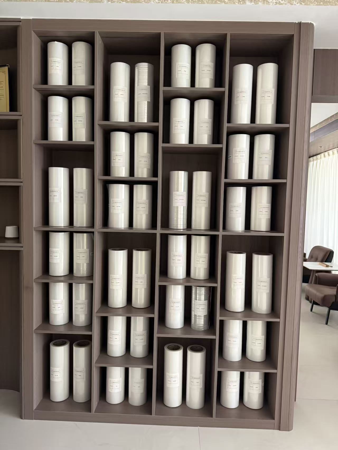 Supplier-provided display of sample film rolls; individual grades and properties are not identified