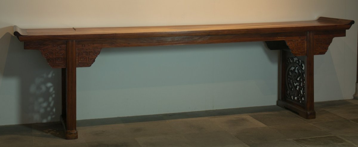 Chinese long side table in huanghuali hardwood, 17th-18th century — illustrating the craftsmanship tradition that Foshan furniture factories continue today